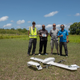 From left to Right, Joss Tepper CTO of Swoop Aero, Leonard Tabilip EPI National Coordinator MOH Vanutu, JimCoyne UAV advisor to CAAV, Doctor Ridwan Gustiana Immunisation Offcier UNICEF Vanuatu infront of Swoop Aero Drone after it successfully completed its third and final scored flight